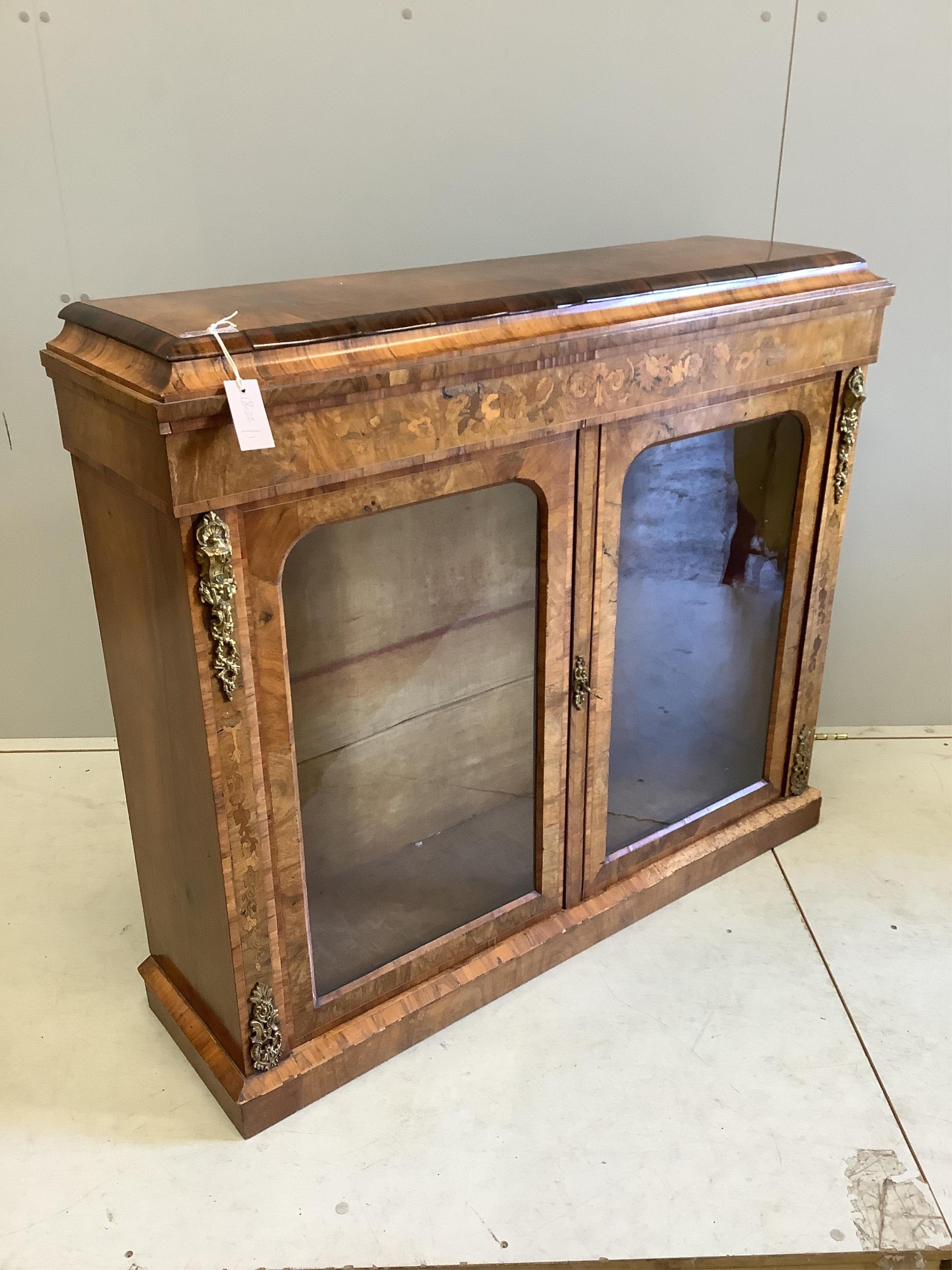 A Victorian gilt metal mounted marquetry inlaid walnut side cabinet, width 117cm, depth 33cm, height 101cm. Condition - fair to good